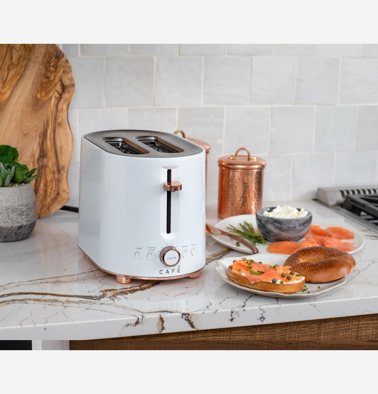 Café Appliances Express Finish 2-slice toaster with copper trim in a kitchen