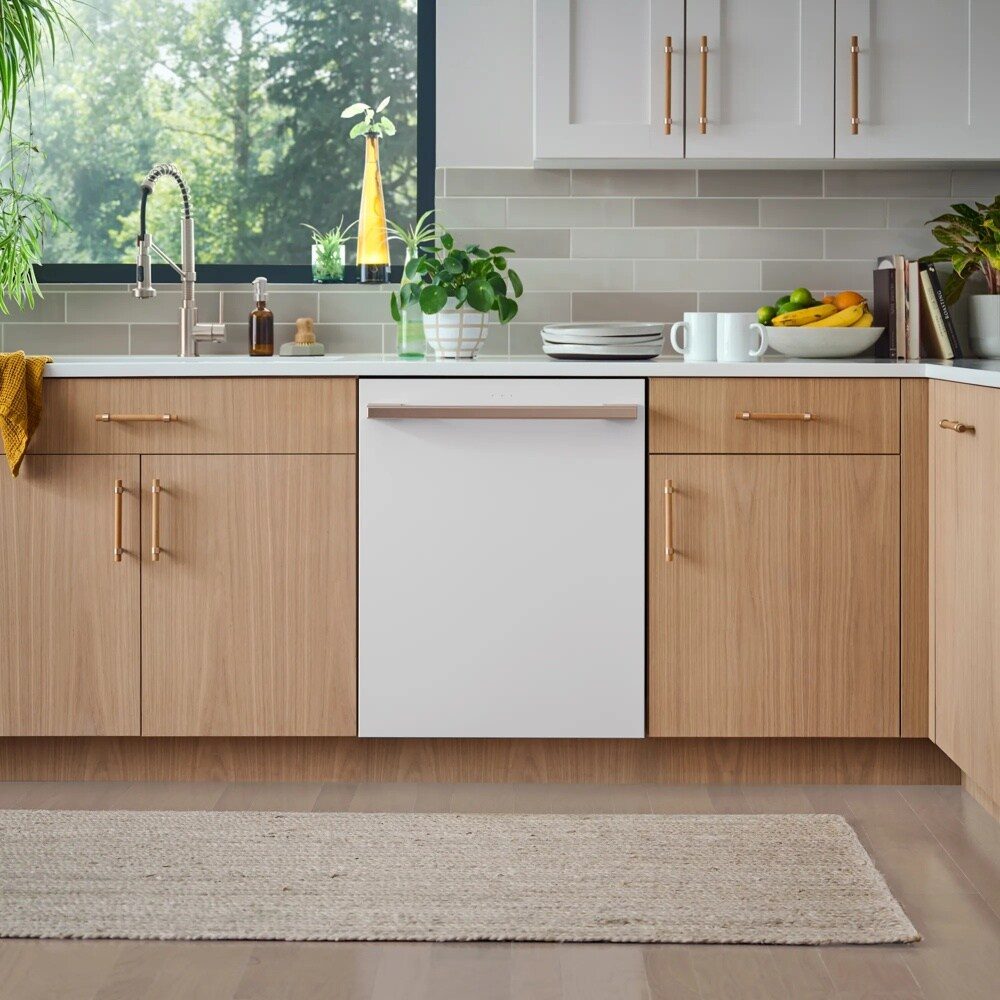 LG Essence White 24 in. top-control dishwasher (LG STUDIO) in a kitchen